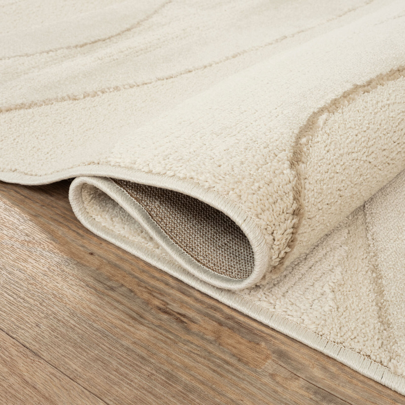 Lido High Low Cream Rug (160 x 230cm)